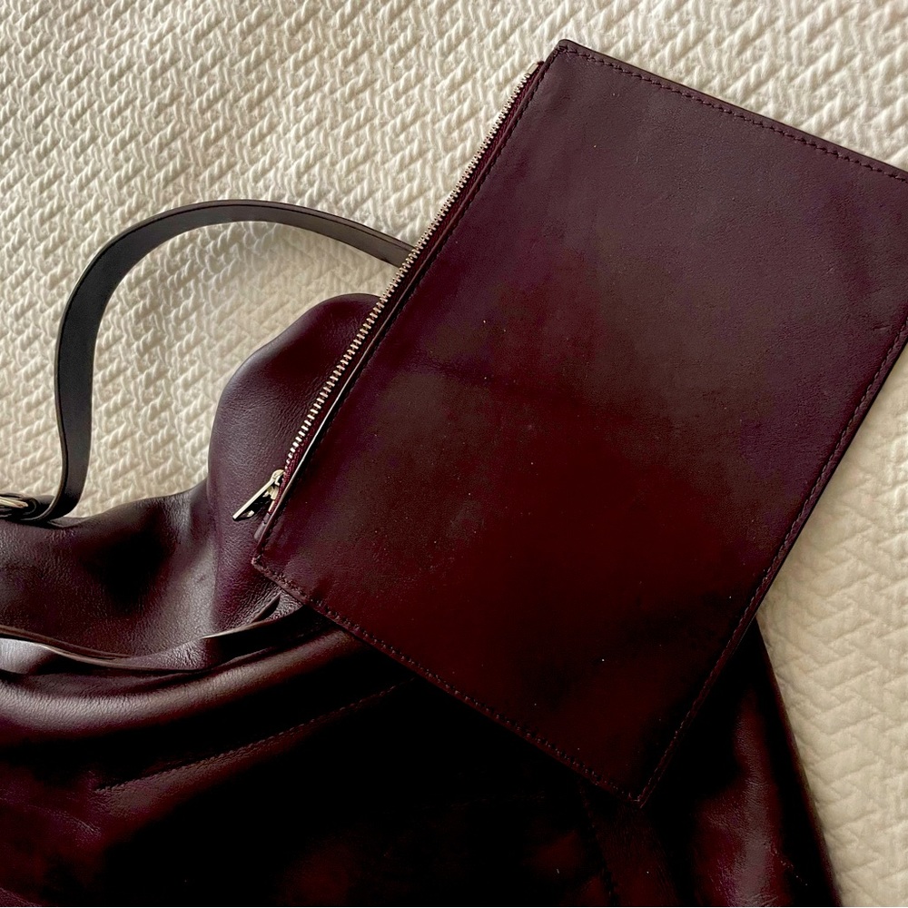 All Saint over the shoulder bag.